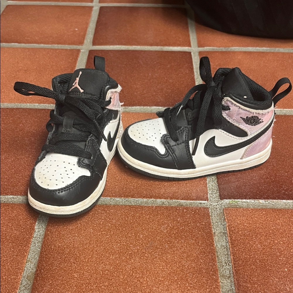 Kids Black and Pink High-Top Nike Jordans